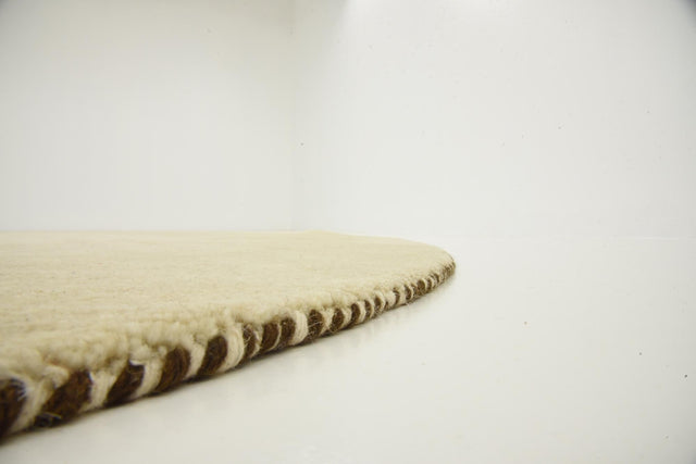 Beige 9' 10 x 9' 10 Solid Gava Round Area Rug 100% High Quality All Natural Wool Minimalist Carpet for Modern Home Interior Design for Sale at Rug Engine