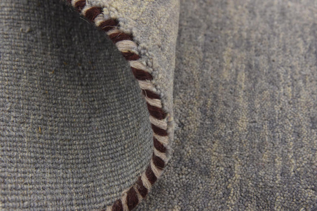 Gray 6' 7 x 6' 7 Solid Gava Round Area Rug 100% High Quality All Natural Wool Minimalist Carpet for Modern Home Interior Design for Sale at Rug Engine