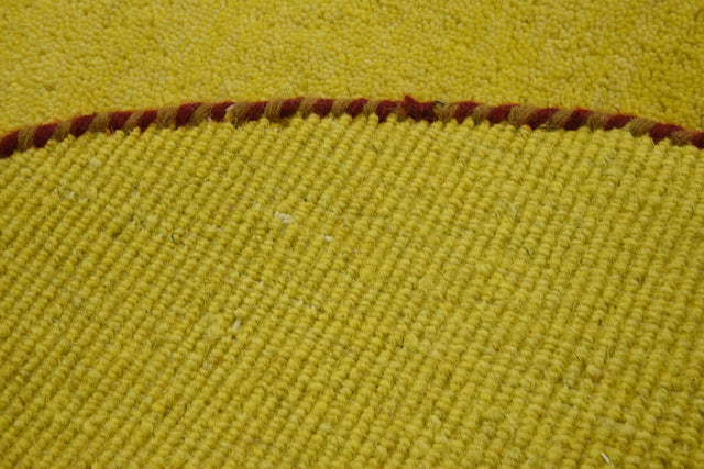 Yellow 2' 4 x 2' 4 Solid Gava Round Area Rug 100% High Quality All Natural Wool Minimalist Carpet for Modern Home Interior Design for Sale at Rug Engine