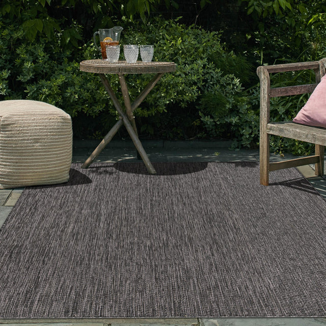 Black 5' 3 x 7' 1 Outdoor Solid Rectangle Area Rug Weather Resistant for Patio, Deck, Terrace, Balcony, Porch 100% Polypropylene Minimalist Waterproof Carpet for Sale at Rug Engine