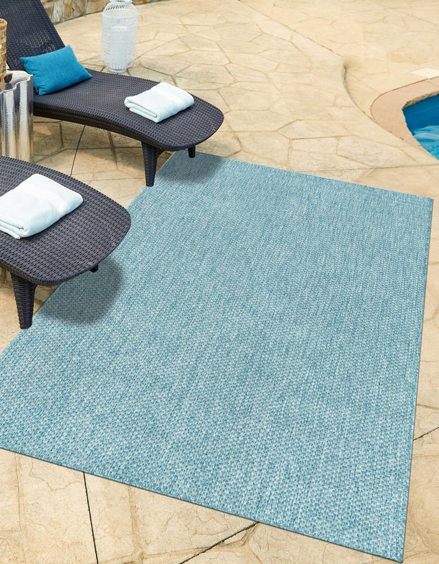 Aquamarine 6' 1 x 9' Outdoor Solid Rectangle Area Rug Weather Resistant for Patio, Deck, Terrace, Balcony, Porch 100% Polypropylene Minimalist Waterproof Carpet for Sale at Rug Engine