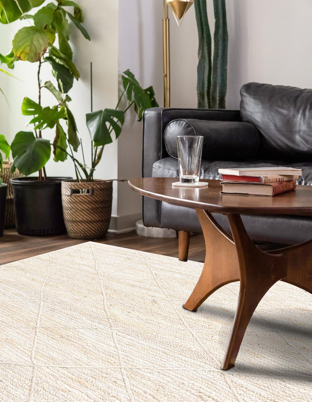 Ivory 9' x 12' Braided Jute Rectangle Area Rug 100% Jute Hand Braided Natural Eco-Friendly Boho Style Carpet for Living Rooms Dining Office Space Dorms for Sale at Rug Engine