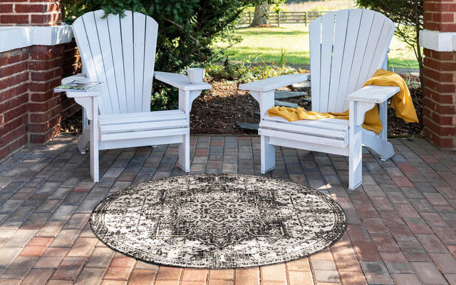 Charcoal Gray 6' 7 x 6' 7 Jill Zarin Outdoor Round Area Rug Weather Resistant for Patio, Deck, Terrace, Balcony, Porch Durable 100% Polypropylene Carpet for Outside for Sale at Rug Engine