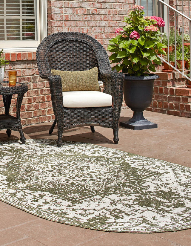 Green 5' 3 x 8' Jill Zarin Outdoor Oval Area Rug Weather Resistant for Patio, Deck, Terrace, Balcony, Porch Durable 100% Polypropylene Carpet for Outside for Sale at Rug Engine