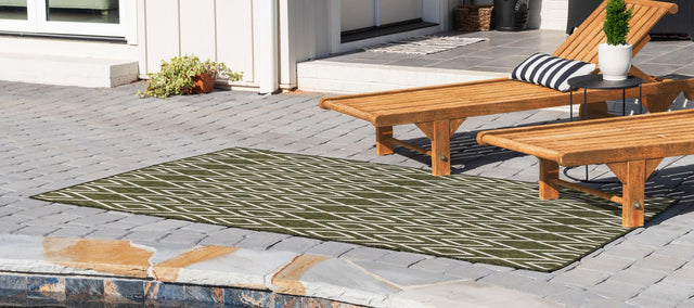 Green 4' 1 x 6' 1 Jill Zarin Outdoor Rectangle Area Rug Weather Resistant for Patio, Deck, Terrace, Balcony, Porch Durable 100% Polypropylene Carpet for Outside for Sale at Rug Engine