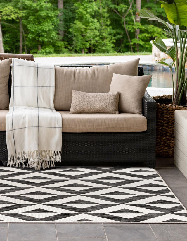 Charcoal Gray 4' 1 x 6' 1 Jill Zarin Outdoor Rectangle Area Rug Weather Resistant for Patio, Deck, Terrace, Balcony, Porch Durable 100% Polypropylene Carpet for Outside for Sale at Rug Engine