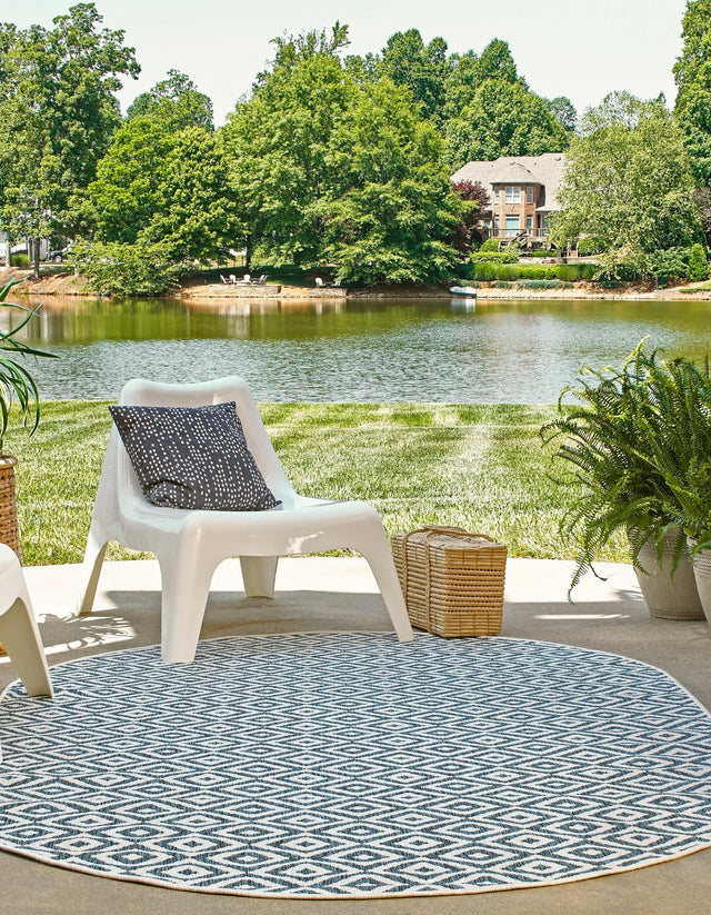 Teal 5' 3 x 8' Jill Zarin Outdoor Oval Area Rug Weather Resistant for Patio, Deck, Terrace, Balcony, Porch Durable 100% Polypropylene Carpet for Outside for Sale at Rug Engine