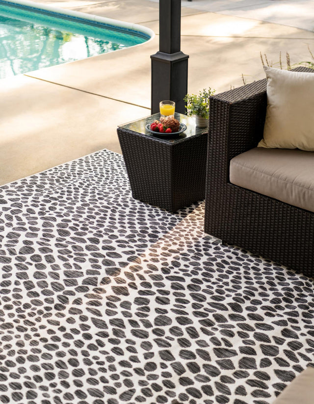Black 5' 3 x 8' Jill Zarin Outdoor Rectangle Area Rug Weather Resistant for Patio, Deck, Terrace, Balcony, Porch Durable 100% Polypropylene Carpet for Outside for Sale at Rug Engine