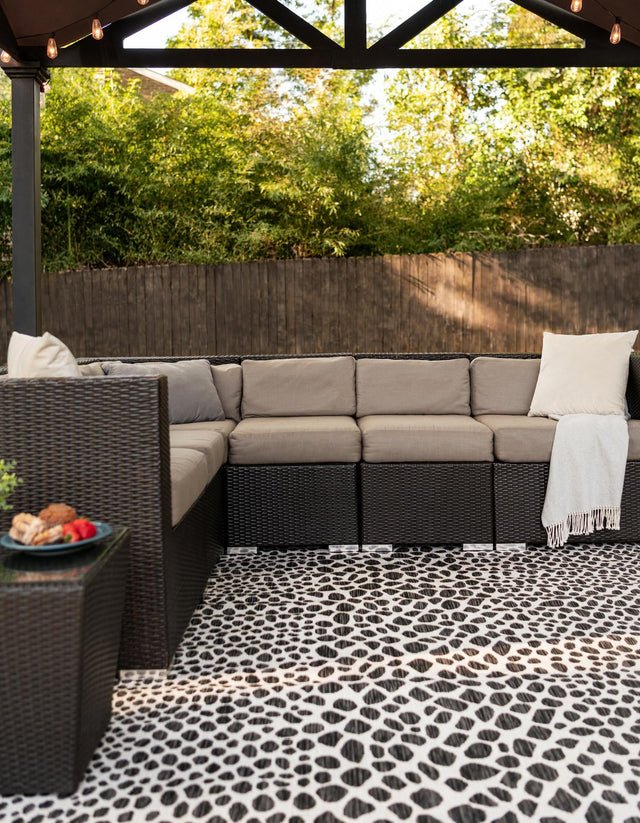 Black 5' 3 x 8' Jill Zarin Outdoor Rectangle Area Rug Weather Resistant for Patio, Deck, Terrace, Balcony, Porch Durable 100% Polypropylene Carpet for Outside for Sale at Rug Engine