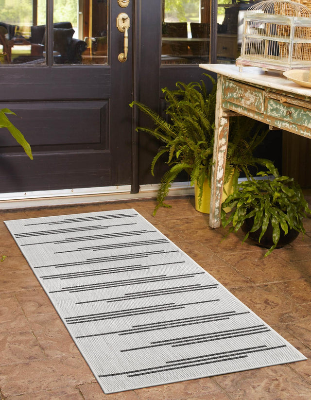 White and Black 2' x 6' 1 Outdoor Modern Runner Area Rug Weather Resistant for Patio, Deck, Terrace, Balcony, Porch 100% Polypropylene Modern Outside Carpet for Sale at Rug Engine