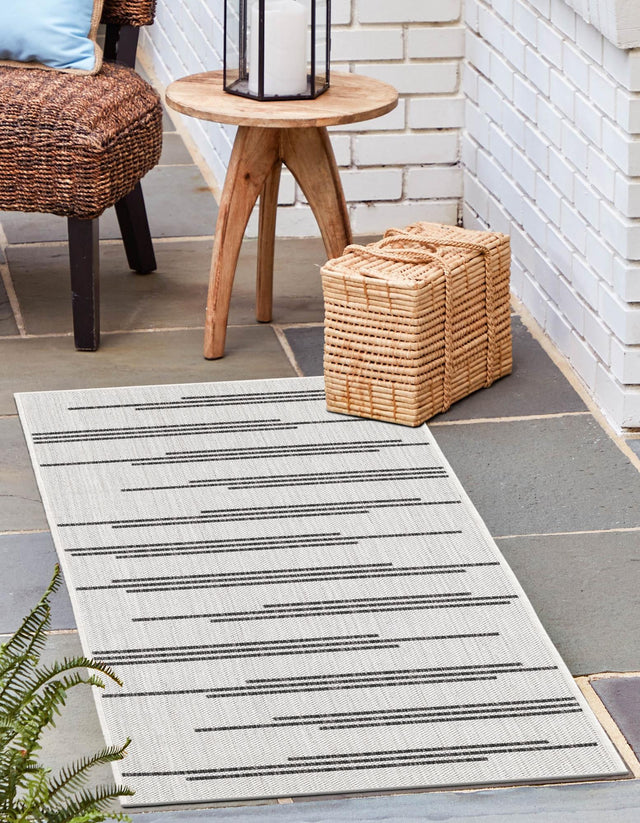 White and Black 2' x 6' 1 Outdoor Modern Runner Area Rug Weather Resistant for Patio, Deck, Terrace, Balcony, Porch 100% Polypropylene Modern Outside Carpet for Sale at Rug Engine