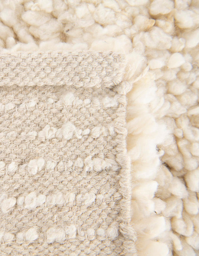 Moroccan Ivory 6' 1 x 9' Haka Deluxe Shag Rectangle Area Rug Thick Soft Touch Fluffy & Plush Shaggy Pile Hand Woven New Zealand Wool Carpet for Sale at Rug Engine
