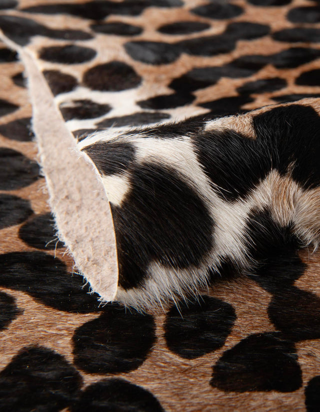 Authentic Luxury Brown and Black 5' 7 x 6' 3 Cowhide Leather Rectangle Area Rug Modern Interior Design 100% Real Natural Cowhide Carpet for Designer Home Decor for Sale at Rug Engine