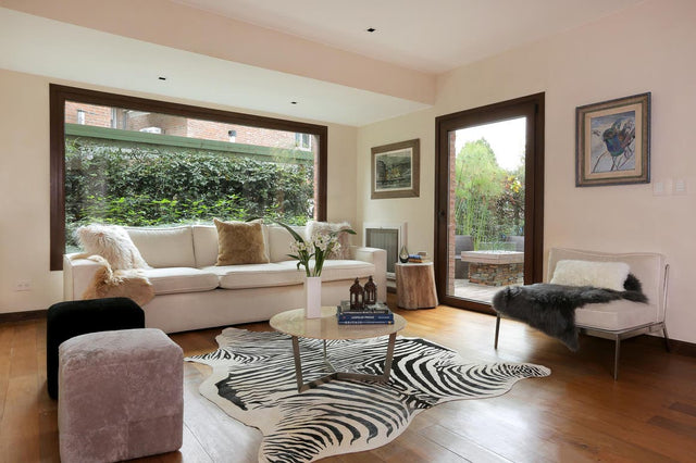 Authentic Luxury Black and White 5' 7 x 6' 3 Cowhide Leather Rectangle Area Rug Modern Interior Design 100% Real Natural Cowhide Carpet for Designer Home Decor for Sale at Rug Engine