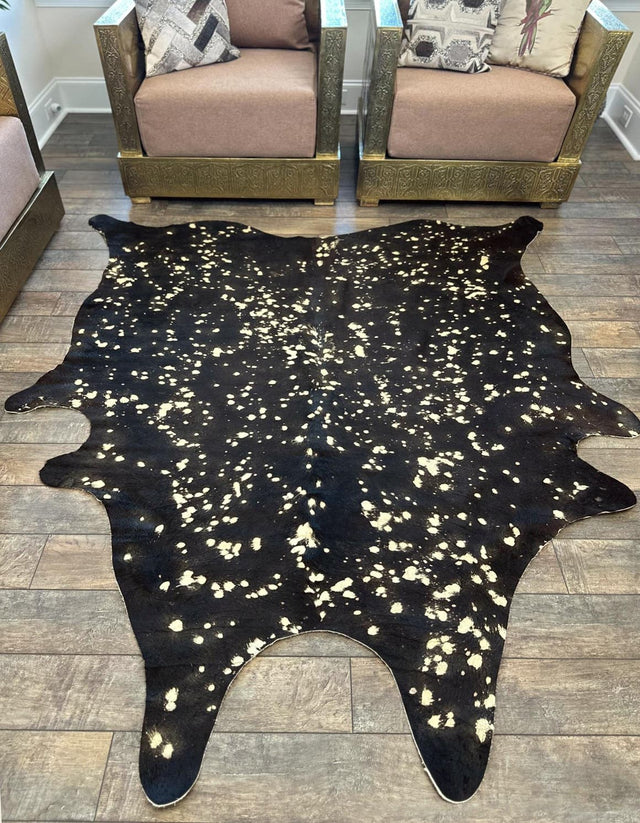 Authentic Luxury Black and Gold 5' 7 x 6' 3 Cowhide Leather Rectangle Area Rug Modern Interior Design 100% Real Natural Cowhide Carpet for Designer Home Decor for Sale at Rug Engine