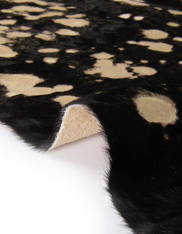 Authentic Luxury Black and Gold 5' 7 x 6' 3 Cowhide Leather Rectangle Area Rug Modern Interior Design 100% Real Natural Cowhide Carpet for Designer Home Decor for Sale at Rug Engine