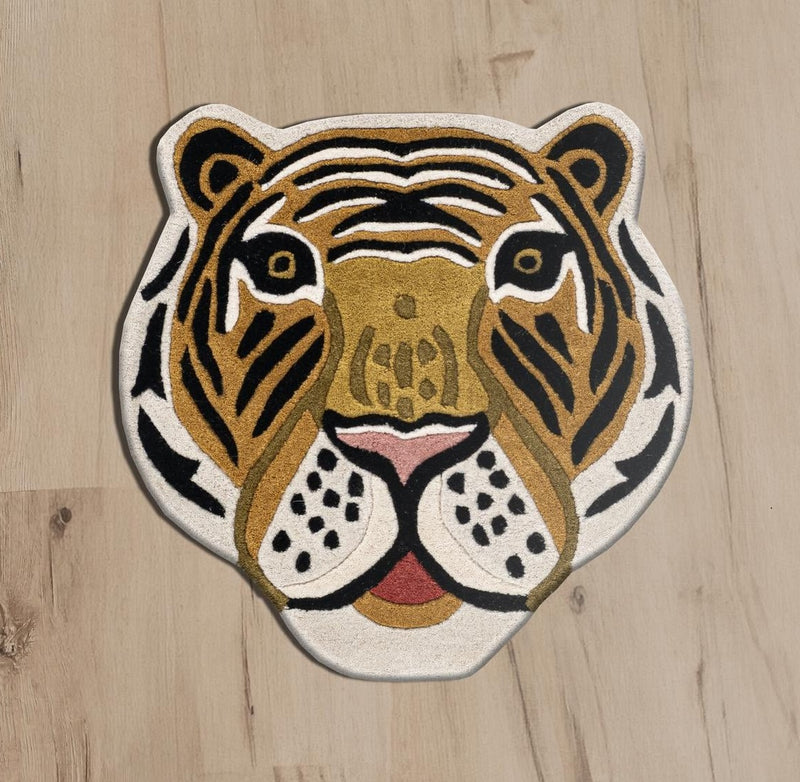 Tiger face black and gold hand tufted wool area rug for kids.