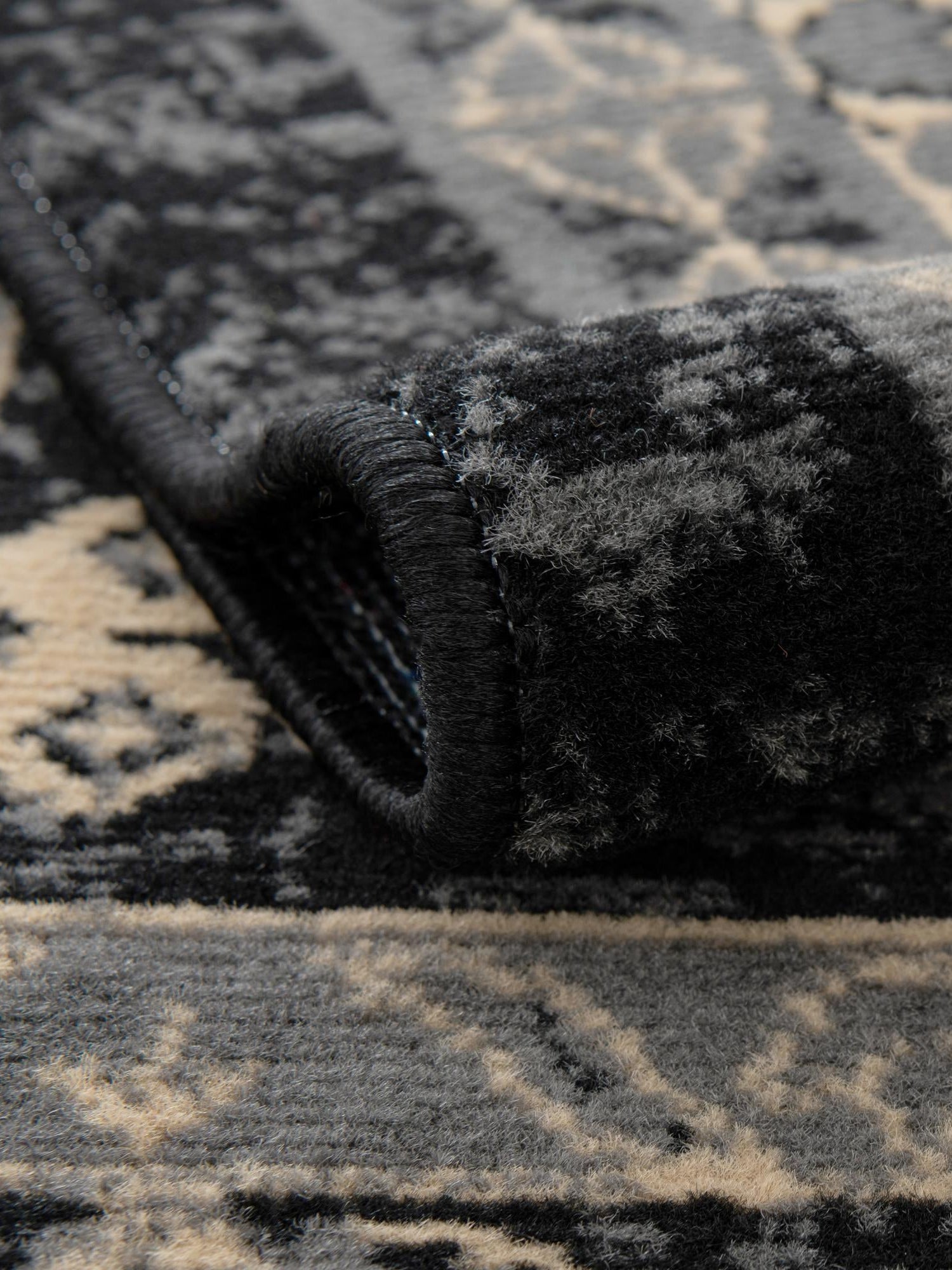 Black 5' 3 x 8' Taftan Rectangle Area Rug