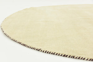 Beige 6' 7 x 6' 7 Solid Gava Round Area Rug 100% High Quality All Natural Wool Minimalist Carpet for Modern Home Interior Design for Sale at Rug Engine