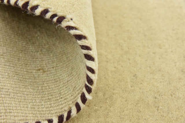 Beige 6' 7 x 6' 7 Solid Gava Round Area Rug 100% High Quality All Natural Wool Minimalist Carpet for Modern Home Interior Design for Sale at Rug Engine