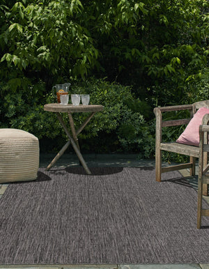 Black 4' 1 x 6' 1 Outdoor Solid Rectangle Rug