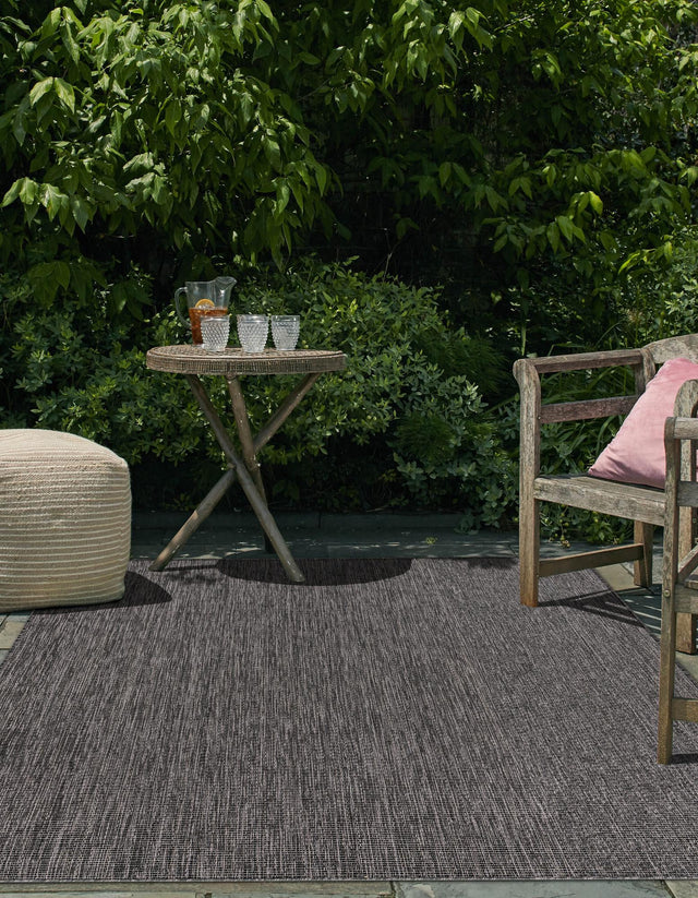 Black 4' 1 x 6' 1 Outdoor Solid Rectangle Rug