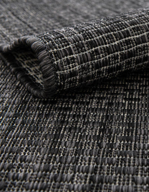 Black 4' 1 x 6' 1 Outdoor Solid Rectangle Rug