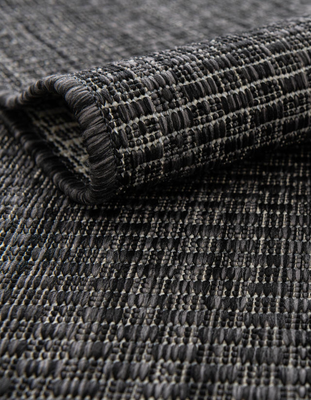Black 4' 1 x 6' 1 Outdoor Solid Rectangle Rug
