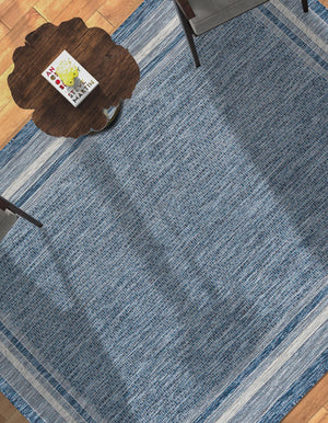Blue 5' 3 x 7' 1 Outdoor Border Rectangle Rug