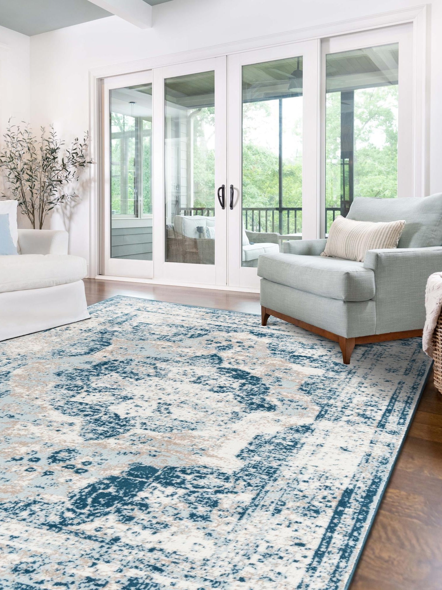 Blue 4' 1 x 6' 1 Sofia Rectangle Area Rug Durable Easy Clean Stain Resistant Unique Carpet for Affordable Interior Home Design for Sale at Rug Engine