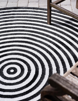 Black 8' x 8' Sabrina Soto Outdoor Round Area Rug Weather Resistant for Patio, Deck, Terrace, Balcony, Porch Durable Carpet for Exterior Home Design for Sale at Rug Engine