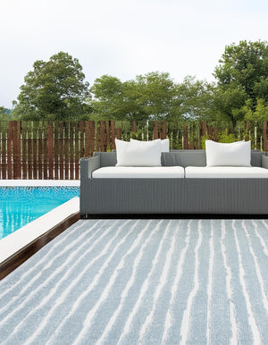 Light Blue 4' 1 x 6' 1 Sabrina Soto Outdoor Rectangle Area Rug Weather Resistant for Patio, Deck, Terrace, Balcony, Porch Durable Carpet for Exterior Home Design for Sale at Rug Engine