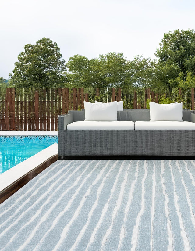 Light Blue 4' 1 x 6' 1 Sabrina Soto Outdoor Rectangle Area Rug Weather Resistant for Patio, Deck, Terrace, Balcony, Porch Durable Carpet for Exterior Home Design for Sale at Rug Engine