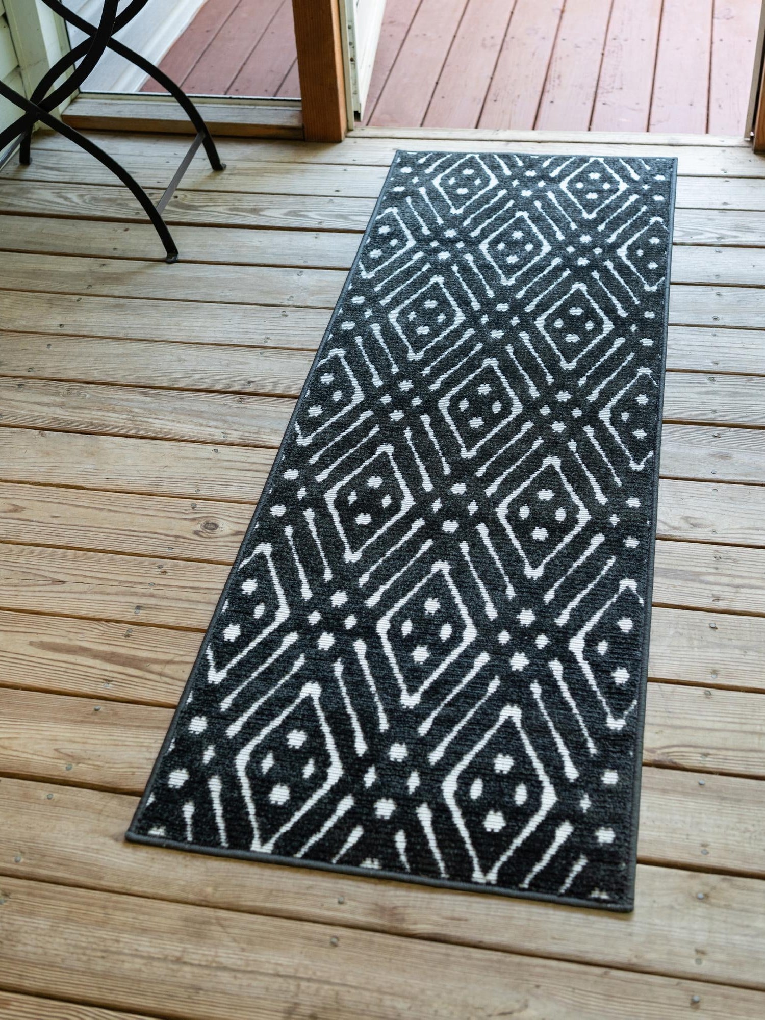 Black 2' x 6' 1 Sabrina Soto Outdoor Runner Area Rug Weather Resistant for Patio, Deck, Terrace, Balcony, Porch Durable Carpet for Exterior Home Design for Sale at Rug Engine