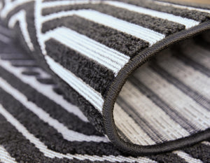Black 4' 1 x 6' 1 Sabrina Soto Outdoor Rectangle Area Rug Weather Resistant for Patio, Deck, Terrace, Balcony, Porch Durable Carpet for Exterior Home Design for Sale at Rug Engine