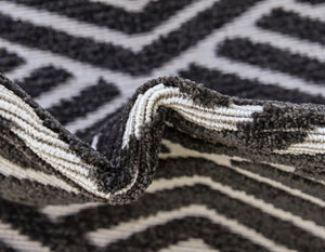 Black 4' 1 x 6' 1 Sabrina Soto Outdoor Rectangle Area Rug Weather Resistant for Patio, Deck, Terrace, Balcony, Porch Durable Carpet for Exterior Home Design for Sale at Rug Engine