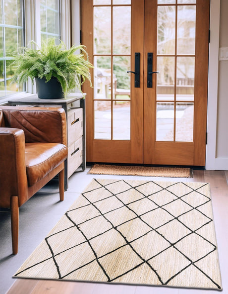 Ivory and Black 6' 1 x 9' Braided Jute Rectangle Area Rug 100% Jute Hand Braided Natural Eco-Friendly Boho Style Carpet for Living Rooms Dining Office Space Dorms for Sale at Rug Engine