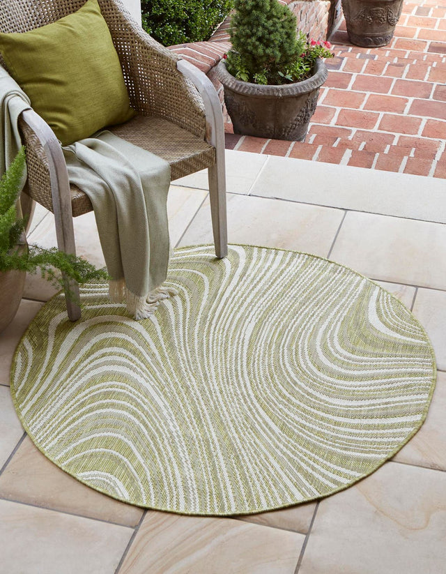 Green 4' 1 x 4' 1 Outdoor Modern Round Area Rug Weather Resistant for Patio, Deck, Terrace, Balcony, Porch 100% Polypropylene Modern Outside Carpet for Sale at Rug Engine