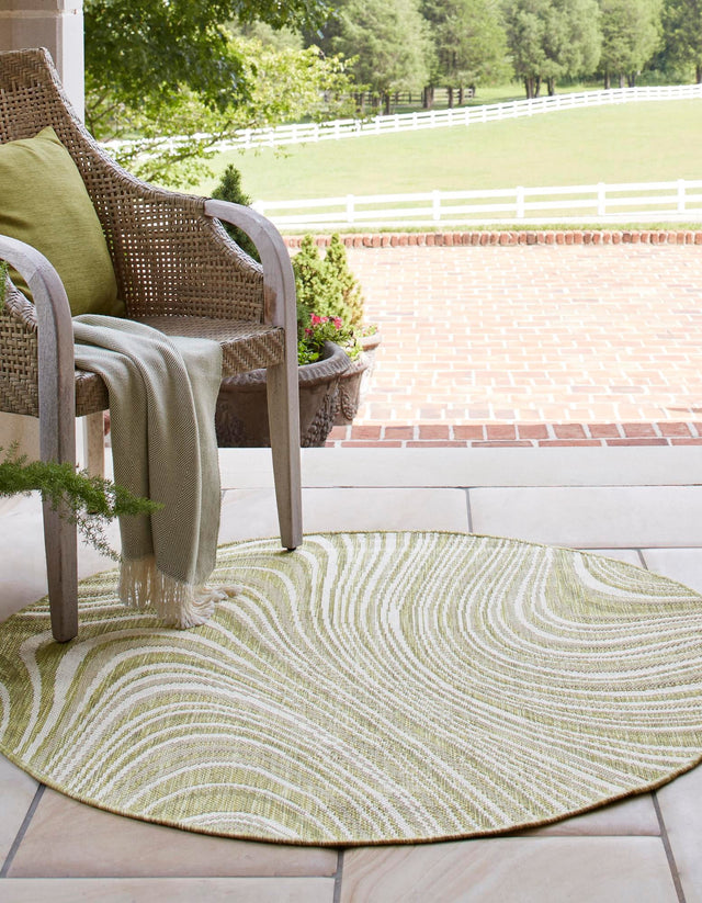 Green 4' 1 x 4' 1 Outdoor Modern Round Area Rug Weather Resistant for Patio, Deck, Terrace, Balcony, Porch 100% Polypropylene Modern Outside Carpet for Sale at Rug Engine