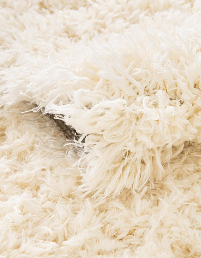 Pearl 4' 1 x 4' 1 Infinity Shag Round Area Rug Thick Soft Touch Fluffy & Plush Shaggy Pile 100% Polypropylene With Jute Backing Solid Color Minimalist Carpet for Sale at Rug Engine
