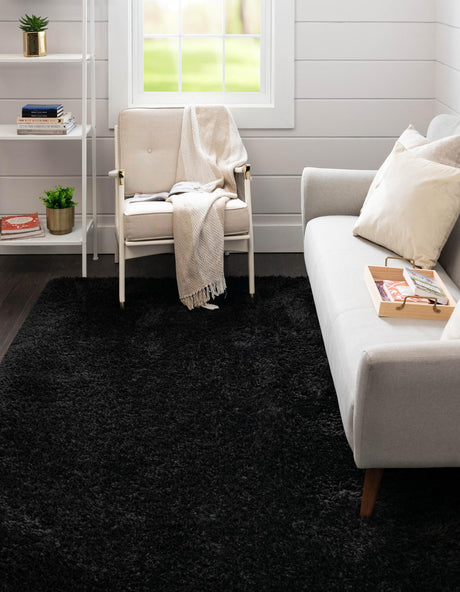 Onyx Black 4' 1 x 6' 1 Infinity Shag Rectangle Area Rug Thick Soft Touch Fluffy & Plush Shaggy Pile 100% Polypropylene With Jute Backing Solid Color Minimalist Carpet for Sale at Rug Engine