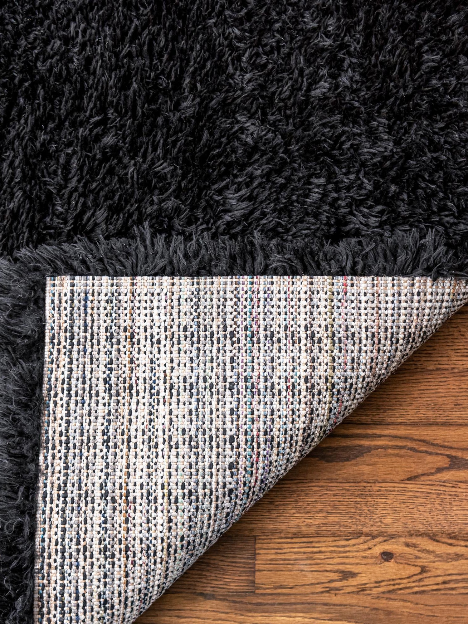 Onyx Black 4' 1 x 6' 1 Infinity Shag Rectangle Area Rug Thick Soft Touch Fluffy & Plush Shaggy Pile 100% Polypropylene With Jute Backing Solid Color Minimalist Carpet for Sale at Rug Engine