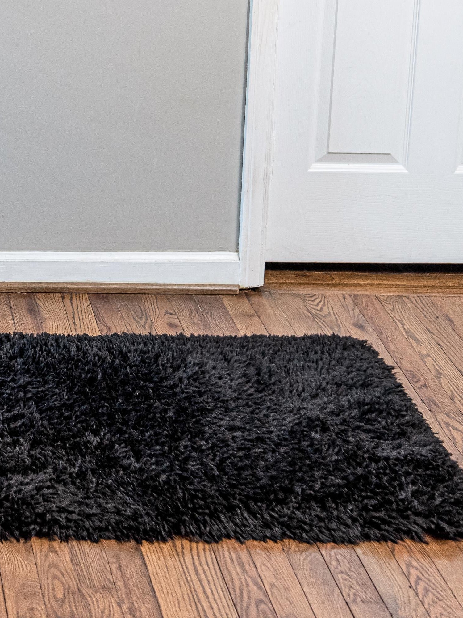 Onyx Black 2' 7 x 10' Infinity Shag Runner Area Rug Thick Soft Touch Fluffy & Plush Shaggy Pile 100% Polypropylene With Jute Backing Solid Color Minimalist Carpet for Sale at Rug Engine