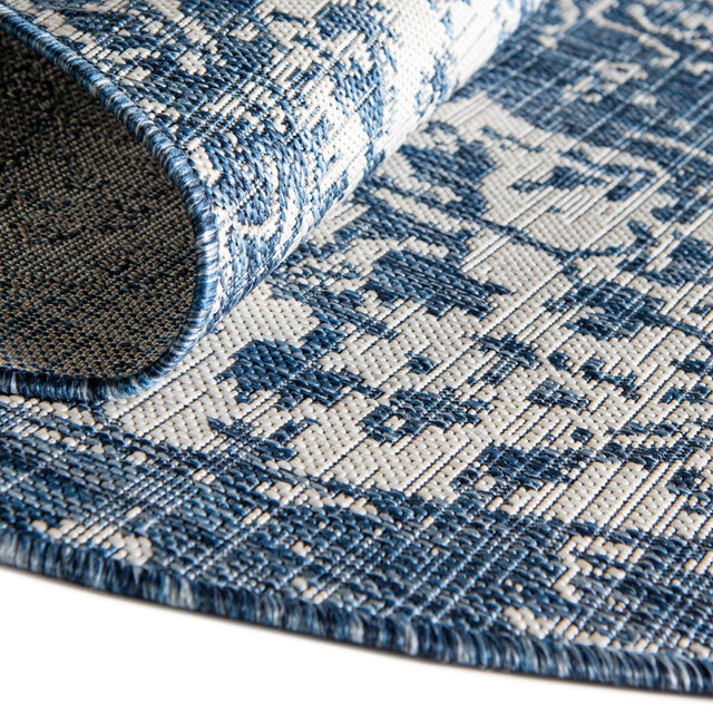 Blue 10' 8 x 10' 8 Jill Zarin Outdoor Round Area Rug Weather Resistant for Patio, Deck, Terrace, Balcony, Porch Durable 100% Polypropylene Carpet for Outside for Sale at Rug Engine