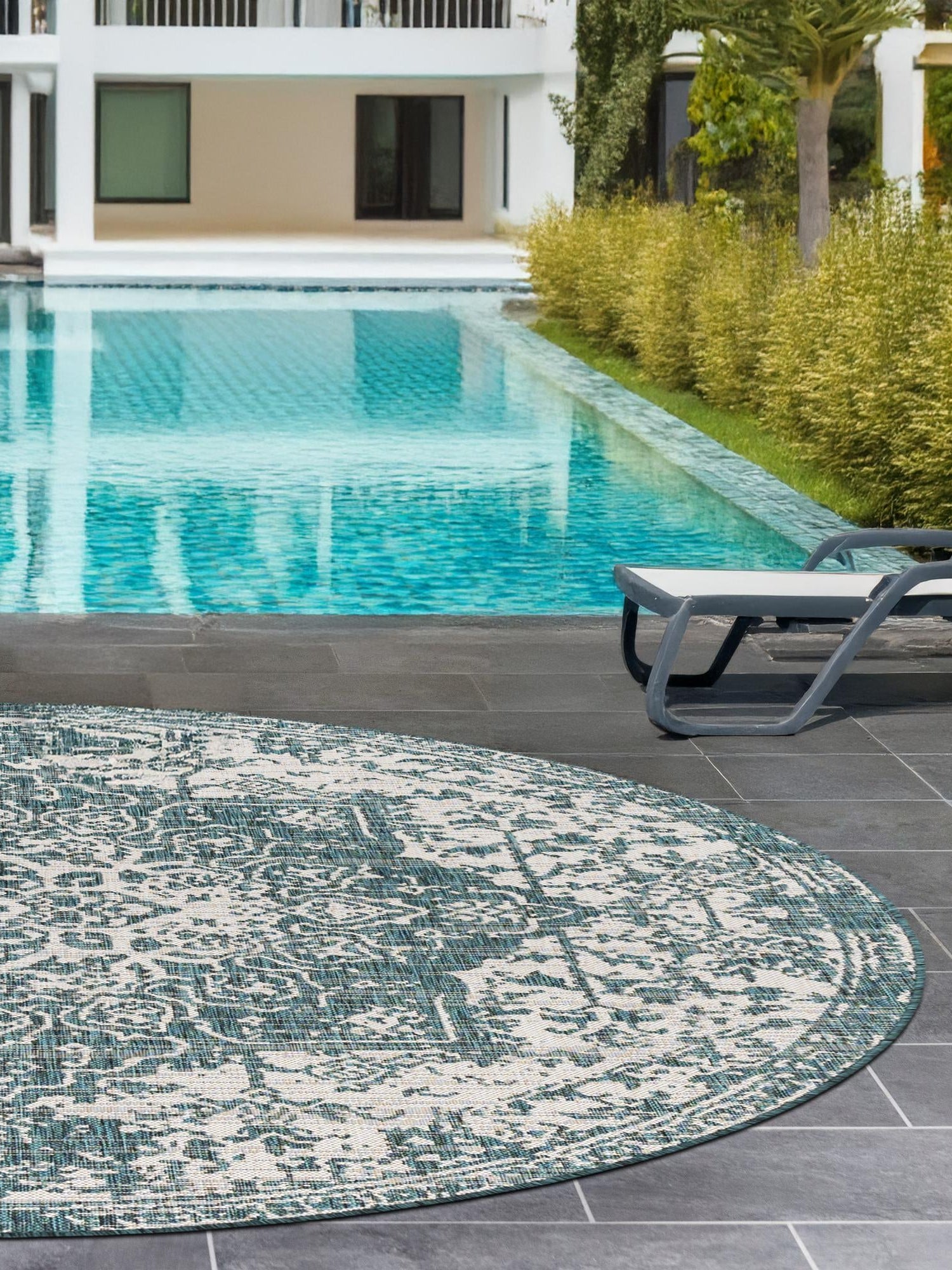 Teal 7' 1 x 7' 1 Jill Zarin Outdoor Round Area Rug Weather Resistant for Patio, Deck, Terrace, Balcony, Porch Durable 100% Polypropylene Carpet for Outside for Sale at Rug Engine