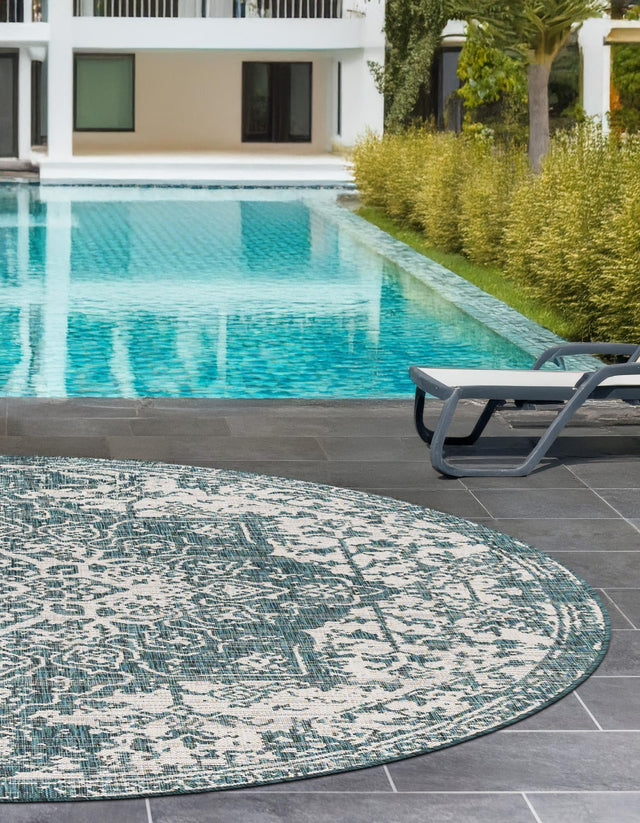 Teal 7' 1 x 7' 1 Jill Zarin Outdoor Round Area Rug Weather Resistant for Patio, Deck, Terrace, Balcony, Porch Durable 100% Polypropylene Carpet for Outside for Sale at Rug Engine