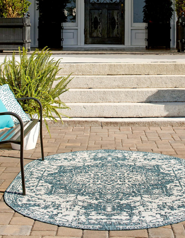 Teal 5' 3 x 8' Jill Zarin Outdoor Oval Area Rug Weather Resistant for Patio, Deck, Terrace, Balcony, Porch Durable 100% Polypropylene Carpet for Outside for Sale at Rug Engine