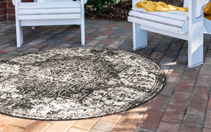Charcoal Gray 6' 7 x 6' 7 Jill Zarin Outdoor Round Area Rug Weather Resistant for Patio, Deck, Terrace, Balcony, Porch Durable 100% Polypropylene Carpet for Outside for Sale at Rug Engine