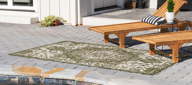 Green 6' 1 x 9' Jill Zarin Outdoor Rectangle Area Rug Weather Resistant for Patio, Deck, Terrace, Balcony, Porch Durable 100% Polypropylene Carpet for Outside for Sale at Rug Engine