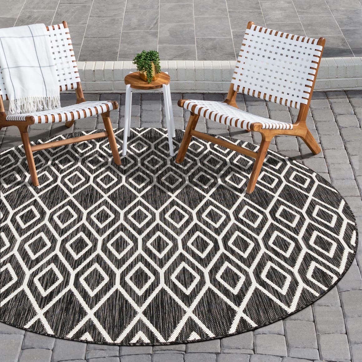 Charcoal Gray 4' 1 x 4' 1 Jill Zarin Outdoor Round Area Rug Weather Resistant for Patio, Deck, Terrace, Balcony, Porch Durable 100% Polypropylene Carpet for Outside for Sale at Rug Engine